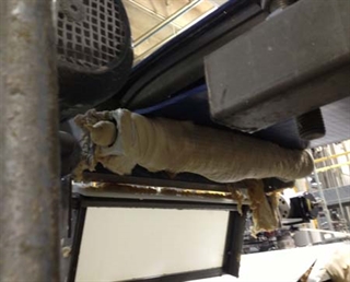 Test Beef scraps on the ground underneath the conveyor