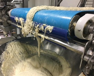 Test Beef scraps on the ground underneath the conveyor